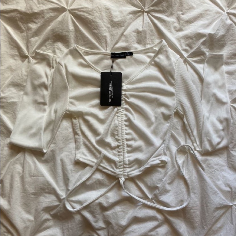Pretty little things white long sleeve top